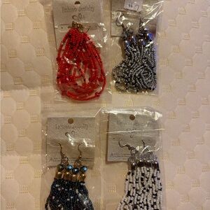 Elegant Beaded Earrings Set in Red, Black, and White